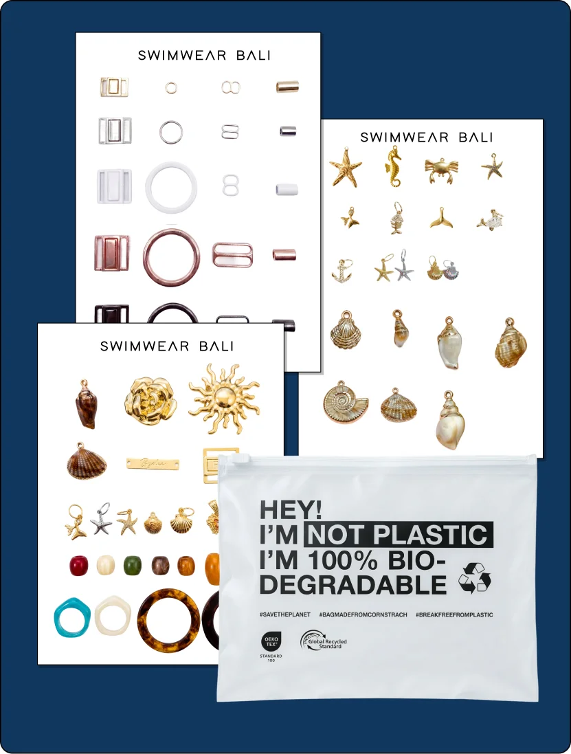 swimwear bali stock hardware and charm cards beside a biodegradable cornstarch zip-lock bag